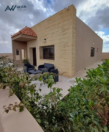 mnzl-dmn-kmbaond-llaygar-big-0