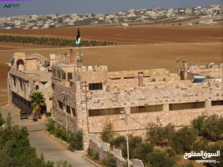 مزرعة في حوارة بجانب سرايا الشرع مساحتها 10 دونم على شارعين